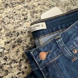 Skinny jeans size 5 from Dress Up boutique. New with tags!